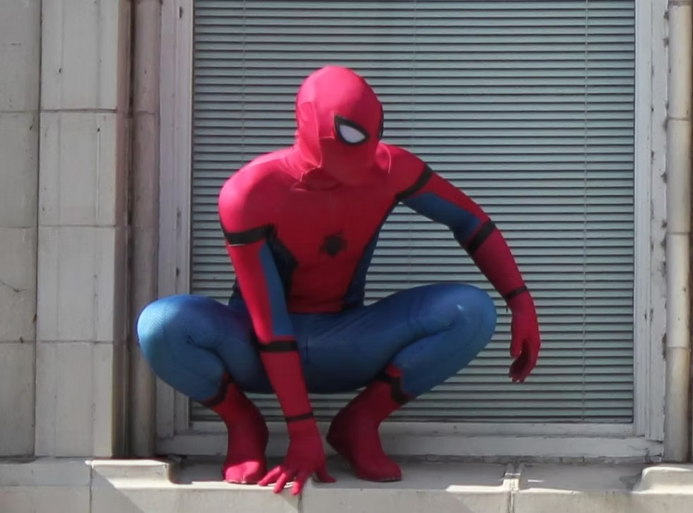 Spider-Guy on building ledge